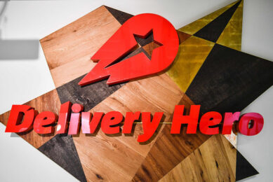 2017-06-27 11:27:50 A view of a logo in a lounge area of the global headquarters of online food ordering and delivery giant Delivery Hero is pictured in Berlin on June 27, 2017. Germany-based online food ordering service Delivery Hero plans a Frankfurt stock market flotation on June 30, 2017 saying investors' cash will help it expand further around the world. / AFP PHOTO / John MACDOUGALL
